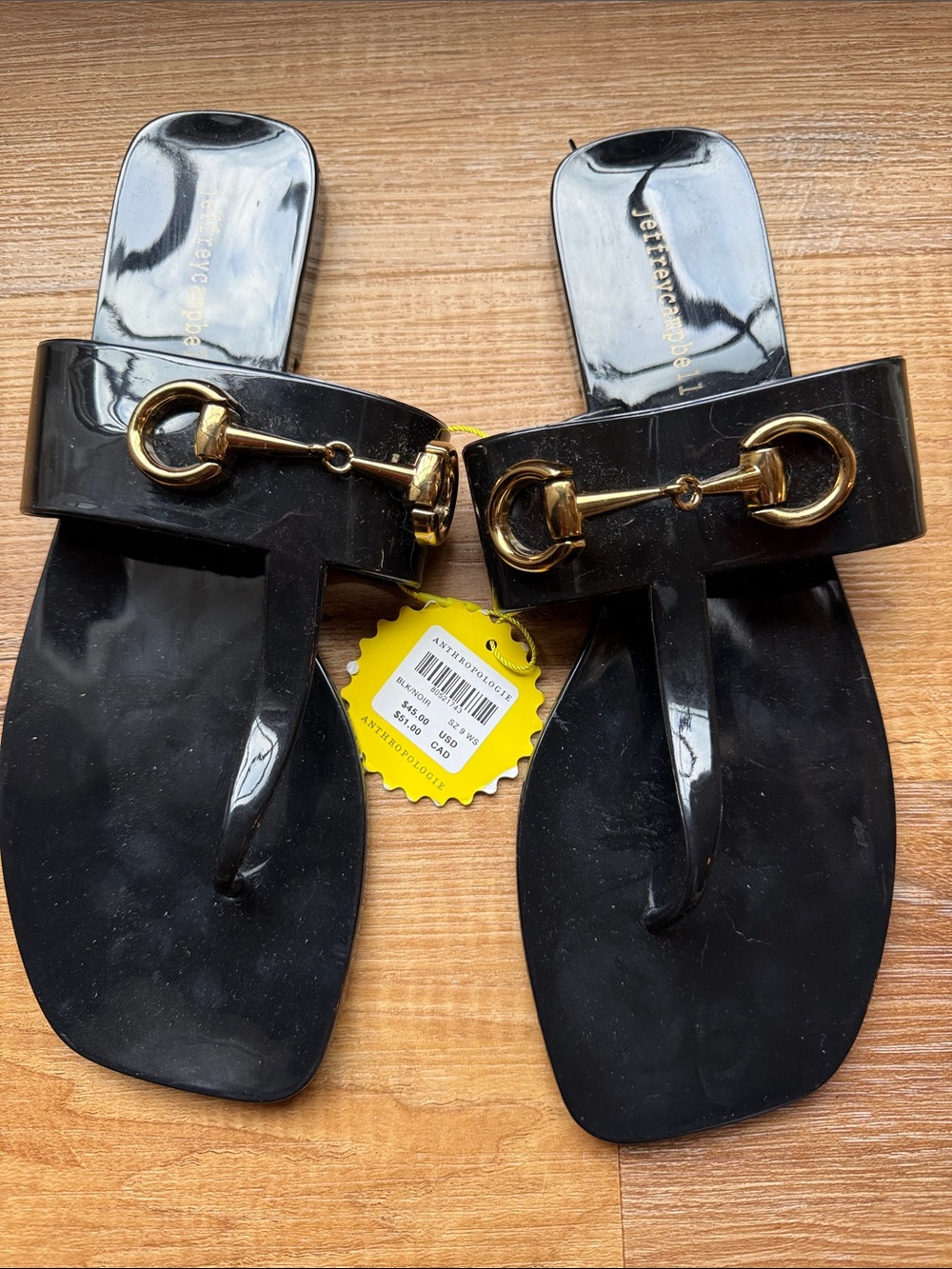 Jeffrey Campbell Black Jelly Thong Sandals with Gold Bit Detail